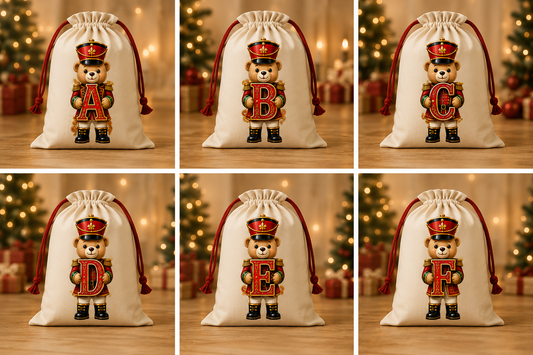 Cream Christmas sacks with Teddy Nutcracker initials A to F