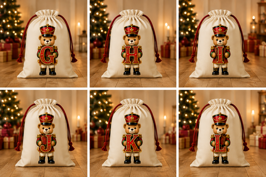 Cream Christmas sacks with Teddy Nutcracker initials G to L